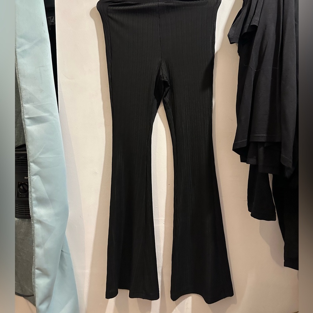Two packs of (black and brown) pants